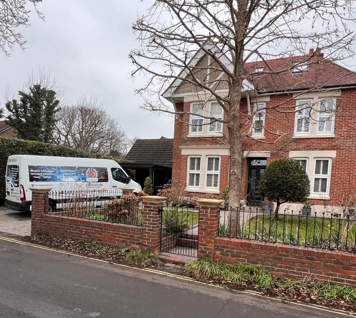 Bespoke made to measure gate and railing finished in a powder coated finish